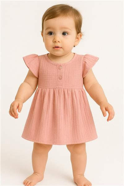 Mousseline babyjurk New Baby roze