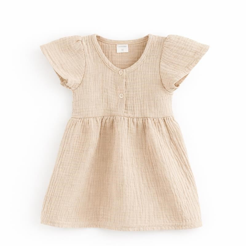 Mousseline babyjurk New Baby beige