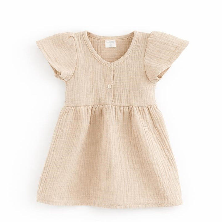Mousseline babyjurk New Baby beige