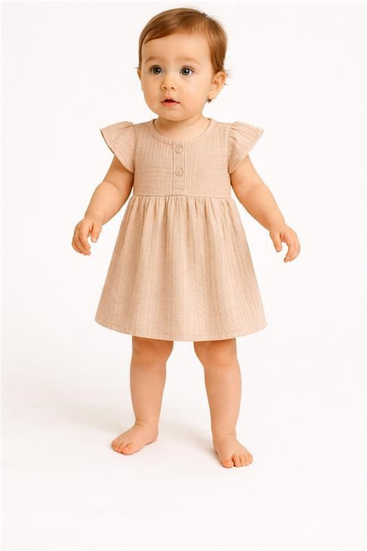 Mousseline babyjurk New Baby beige