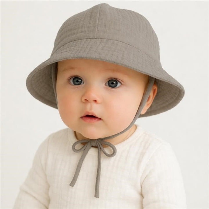 Mousseline babymutsje New Baby linnen