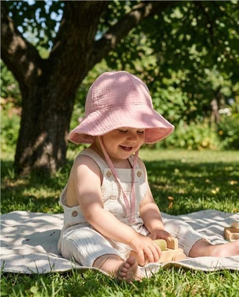 Mousseline babymutsje New Baby roze